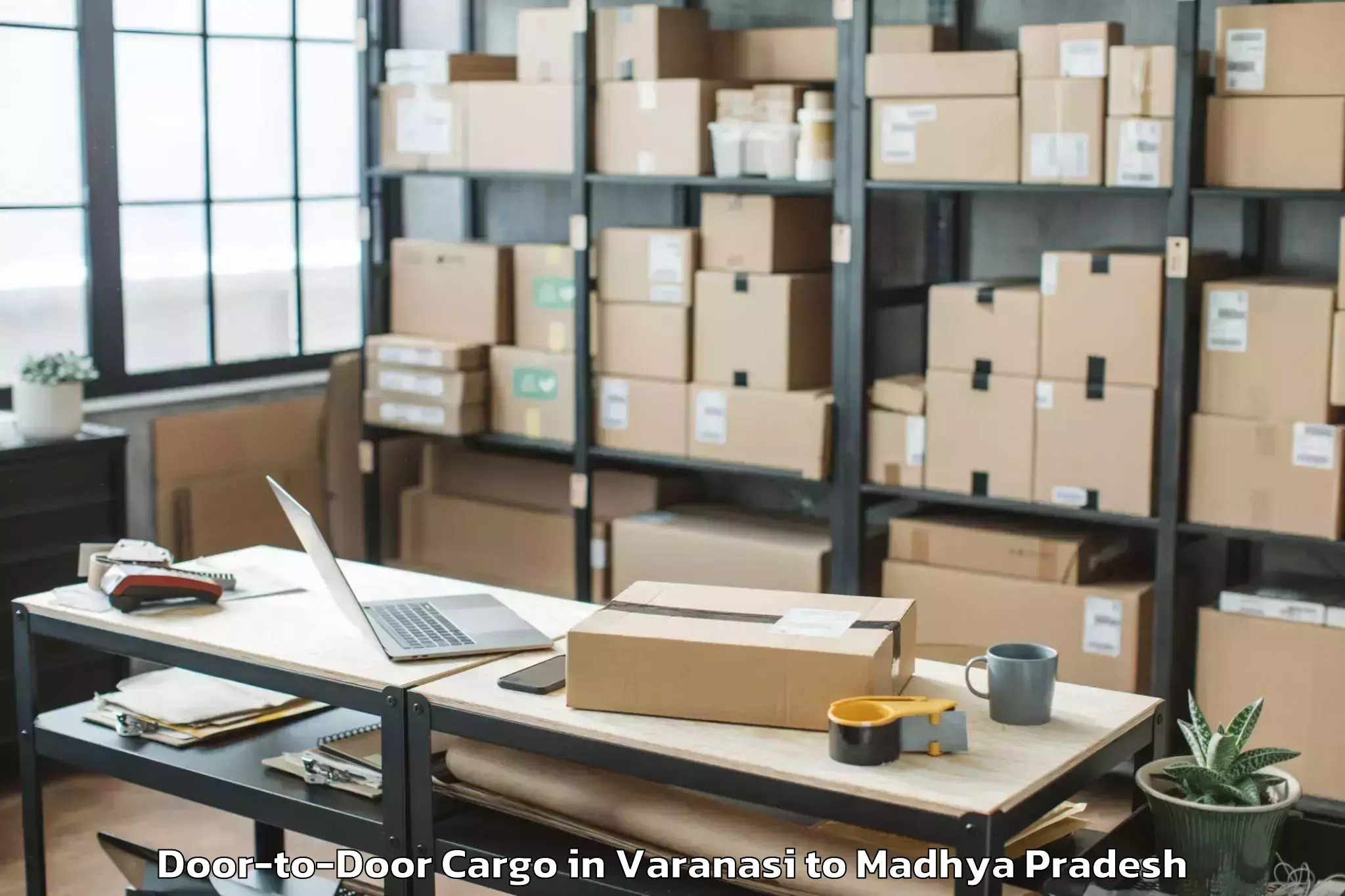 Book Varanasi to Neemuch Door To Door Cargo Online